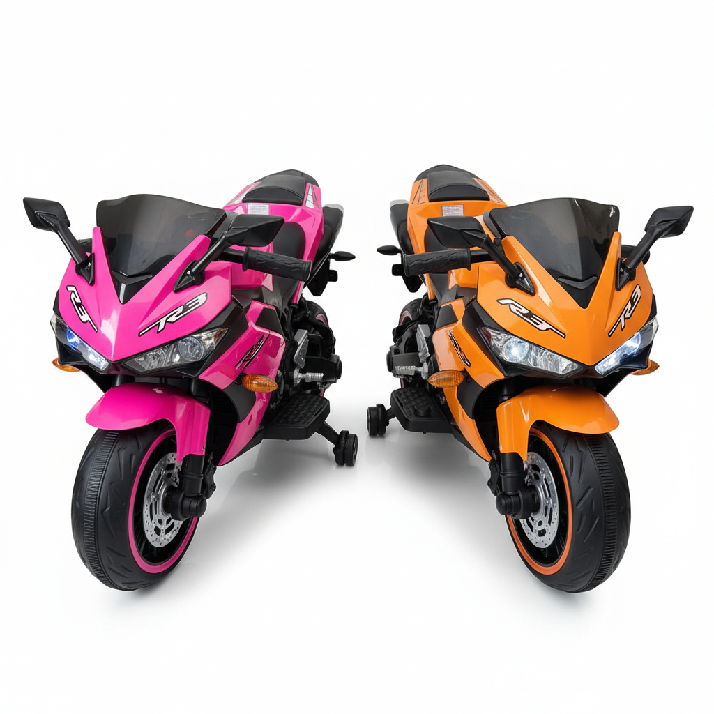 Pink and orange kids electric ride-on motorbikes shown together from a front three-quarter angle on a white studio background